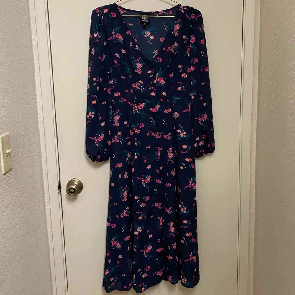 Long dress with cut at the end